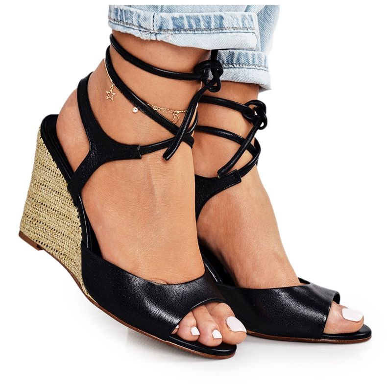 Sandálias de couro em cunha trançada Laura Messi 1944 preta preto