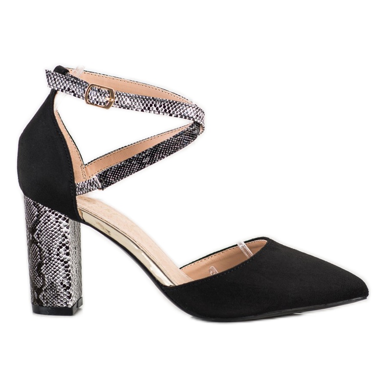 S. BARSKI Bombas elegantes em um pilar preto