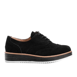 Sapatos pretos de camurça com sola alta do Quênia