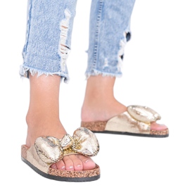 Chinelos dourados com laço Norris Chinelos dourados com laço Norris