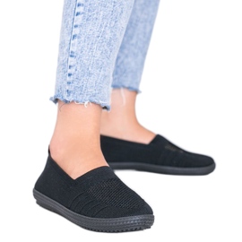 Tênis com orifícios pretos profundos Slip On