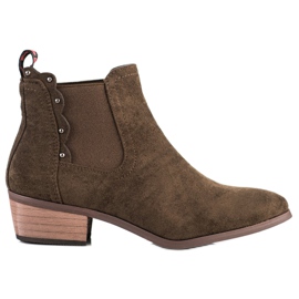 J. Star Botas marrons em um poste baixo castanho J. Star Botas marrons em um poste baixo castanho