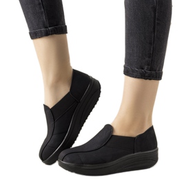 Sapatos pretos com sola alta Spike Sapatos pretos com sola alta Spike