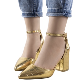 Bombas de ouro no pilar Davies dourado Bombas de ouro no pilar Davies dourado