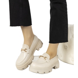 Mocassins bege com sola alta de Anouk dourado