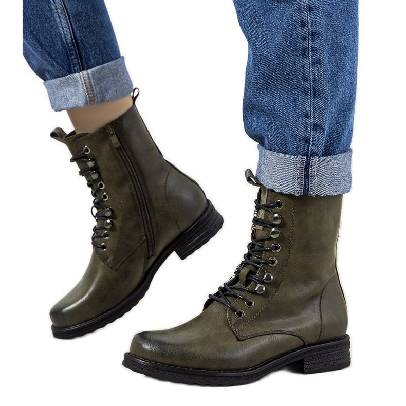 Botas isoladas verdes de Muro