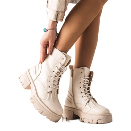 Seastar Armadilhas de botas na plataforma bege