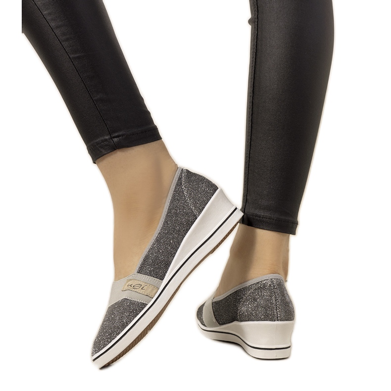 Tênis de cunha cinza da Burris