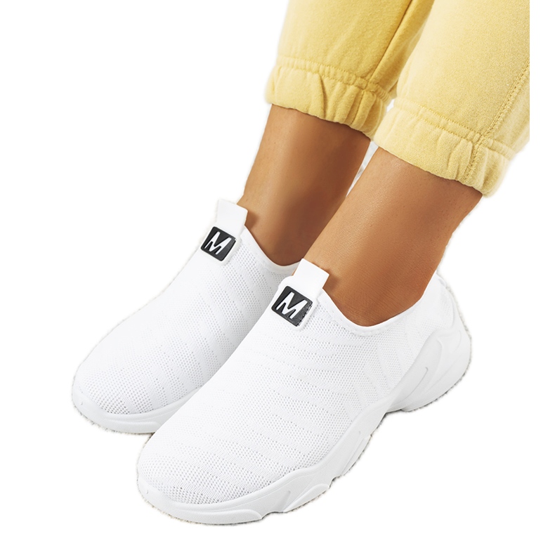 BM Os tênis brancos de Aaron