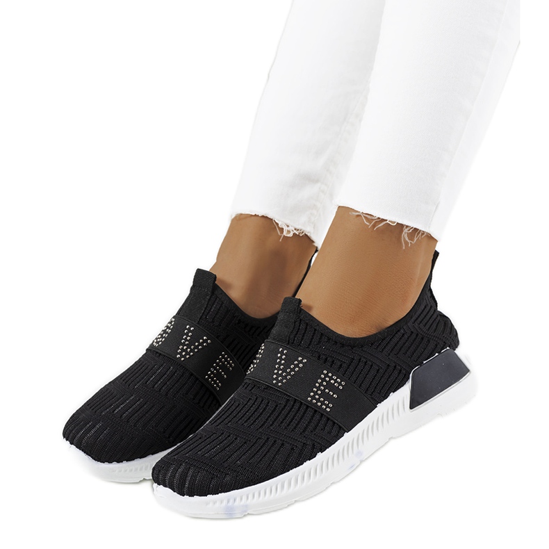 Tênis pretos de Brian