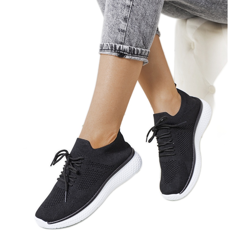 Os tênis esportivos pretos de Michael