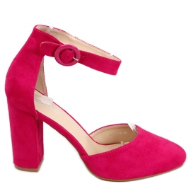 Bombas expostas no calcanhar de Iris Fuchsia rosa