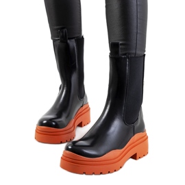Botins pretos com sola Nester laranja