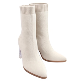 Carolyn Botas bege com salto alto Carolyn Botas bege com salto alto