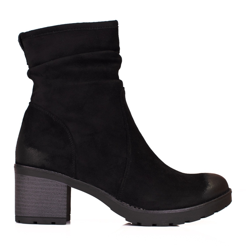 Botas Vinceza de mulher negra no poste preto
