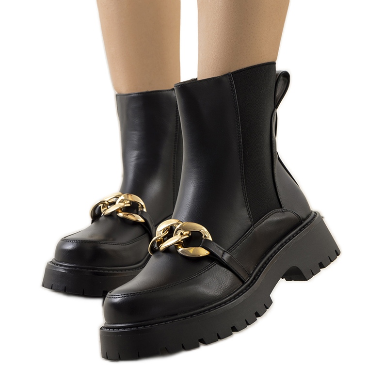 Botas pretas em uma sola alta Pesa preto