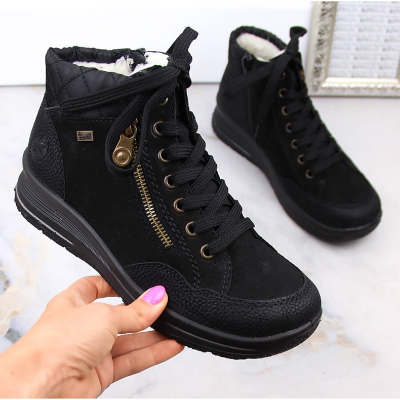 Botas isolantes femininas de couro impermeável Rieker L7701-00 pretas preto