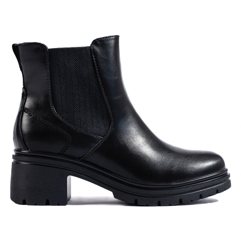 Botas Chelsea pretas de senhora no poste preto