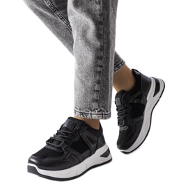 Sapatilhas pretas de materiais combinados da Caya preto