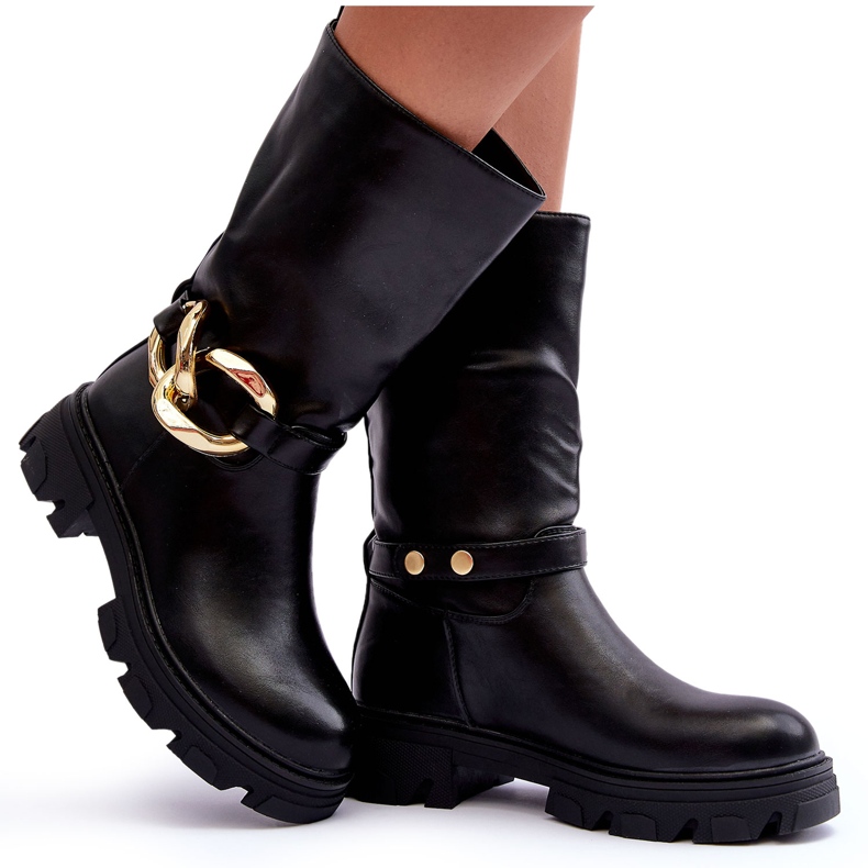 Botas de couro de salto plano feminino com uma decoração negra preto