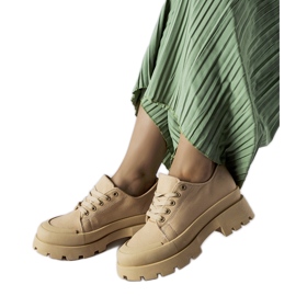 Sapatos marrons com sola de ponta maciça marrom