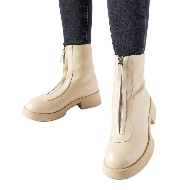 Botins isolados bege com zíper Baldo