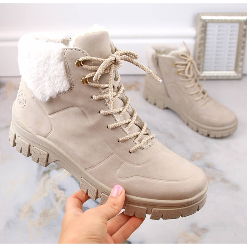 Botins femininos confortáveis ​​e isolados bege da Rieker