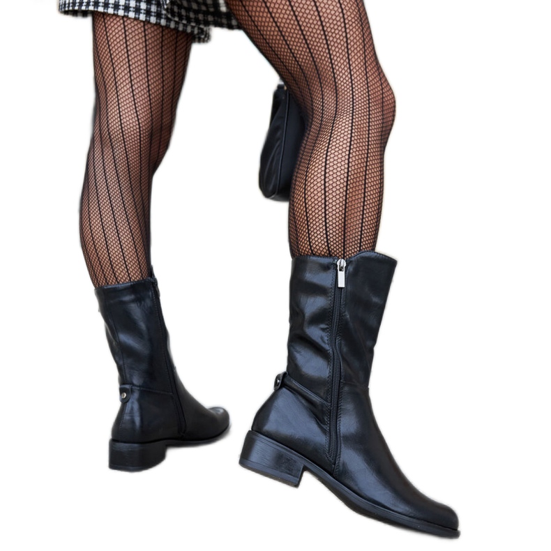 Botas de cano alto isoladas pretas da Mayonga preto