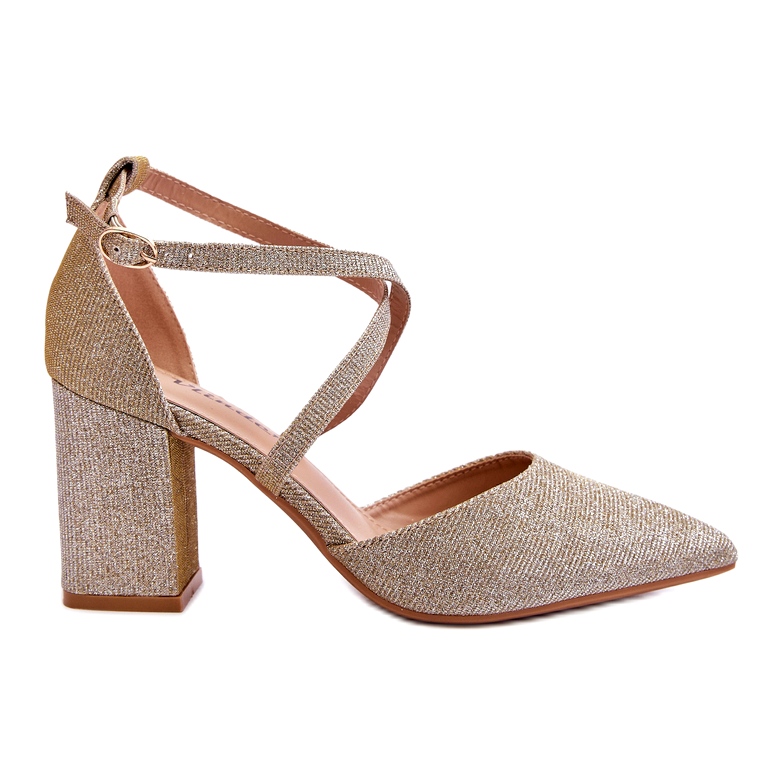 Bombas elegantes de salto alto dourado brilhante