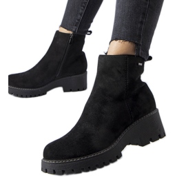 Botins pretos com isolamento e sola Pieve grossa
