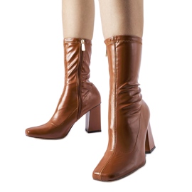 Botins marrons da Upland marrom