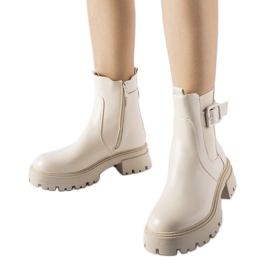 Botins bege com isolamento e fivela Casola