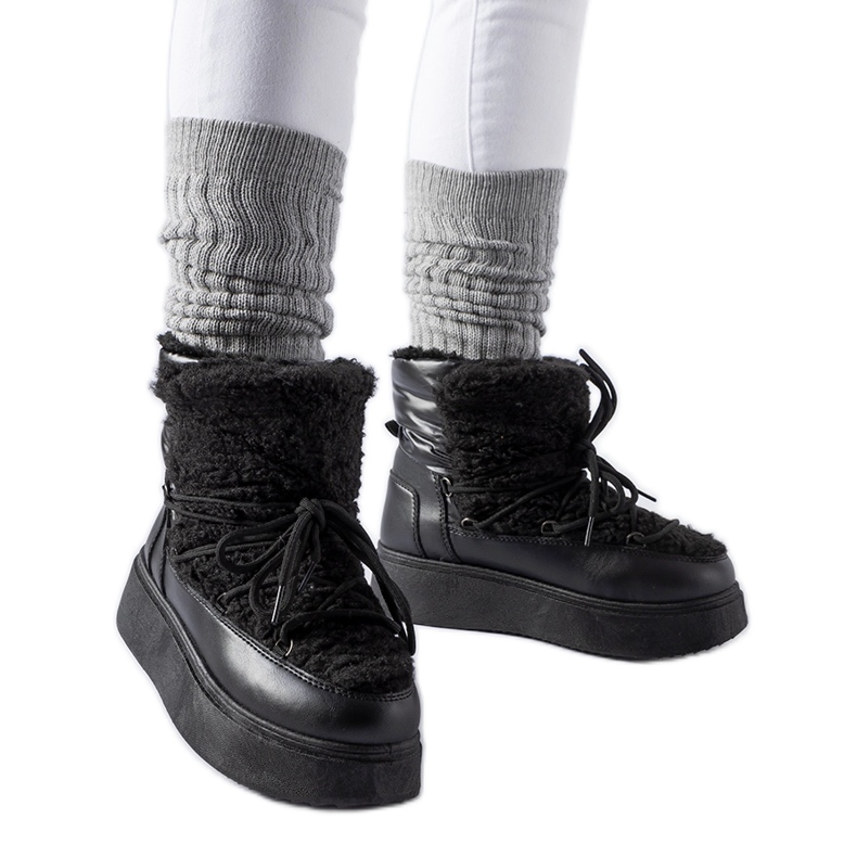 Botas de neve pretas em uma enorme plataforma Elvio preto