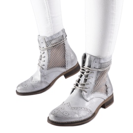 Botas rasteiras prateadas com orifícios da Reeves prata Botas rasteiras prateadas com orifícios da Reeves prata