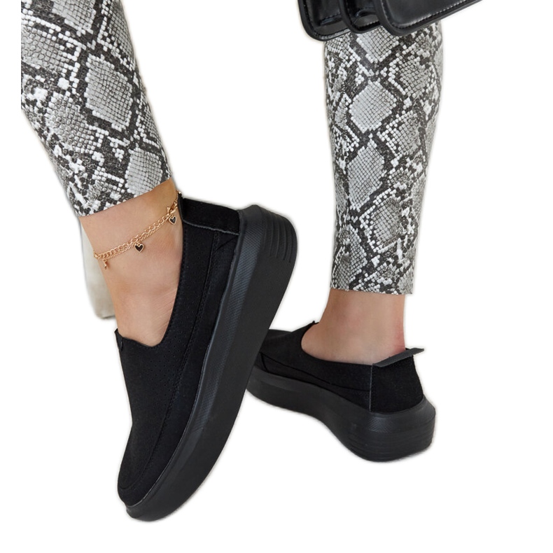 Os sapatos pretos da Marcie