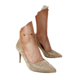 Salto alto dourado brilhante com palmilha de couro