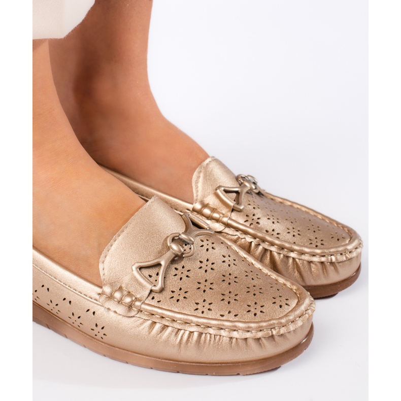 Mocassins dourados femininos