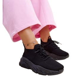 Tênis preto com sola Kassi enorme Tênis preto com sola Kassi enorme