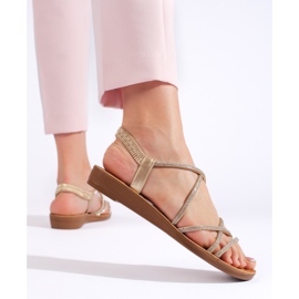 Sandália slip-on dourada com strass dourado