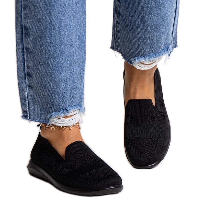 Tênis preto de Rahim com sola de espuma