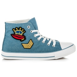 Sapatilhas altas na encadernação azul Sapatilhas altas na encadernação azul