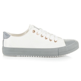 Seastar Tênis amarrados em uma plataforma colorida branco Seastar Tênis amarrados em uma plataforma colorida branco