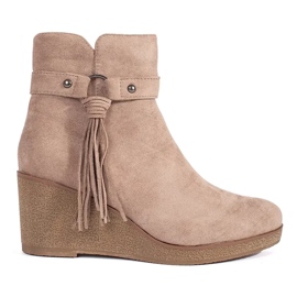 Botas femininas de camurça bege com franjas