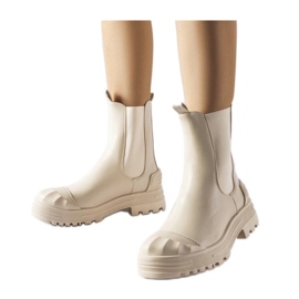 Botins maciços com isolamento bege da Albanese - Solea Botins maciços com isolamento bege da Albanese - Solea