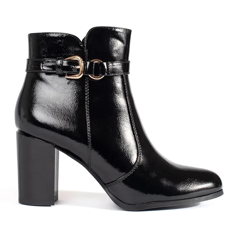 Botins pretos de salto alto envernizados por Sergio Leone