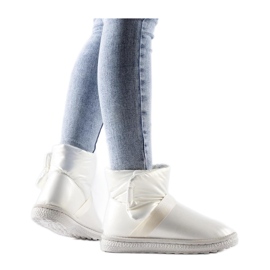 Botas de neve curtas bege brilhantes de Delaune - Solea