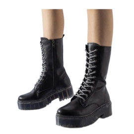 Botas pretas, couro natural, isoladas preto Botas pretas, couro natural, isoladas preto