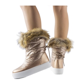 Botas de neve metálicas com pele decorativa rosa