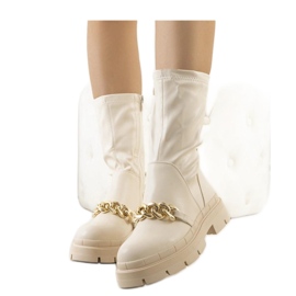 Botas bege com sola alta