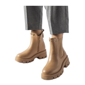 Botins decorativos com isolamento bege